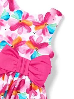 Abito stampa floreale e fiocco in vita magenta