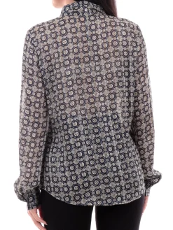 Blusa con fiocco e manica a sbuffo fantasia