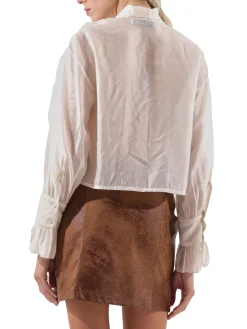 Blusa con fiocco e maniche a sbuffo burro