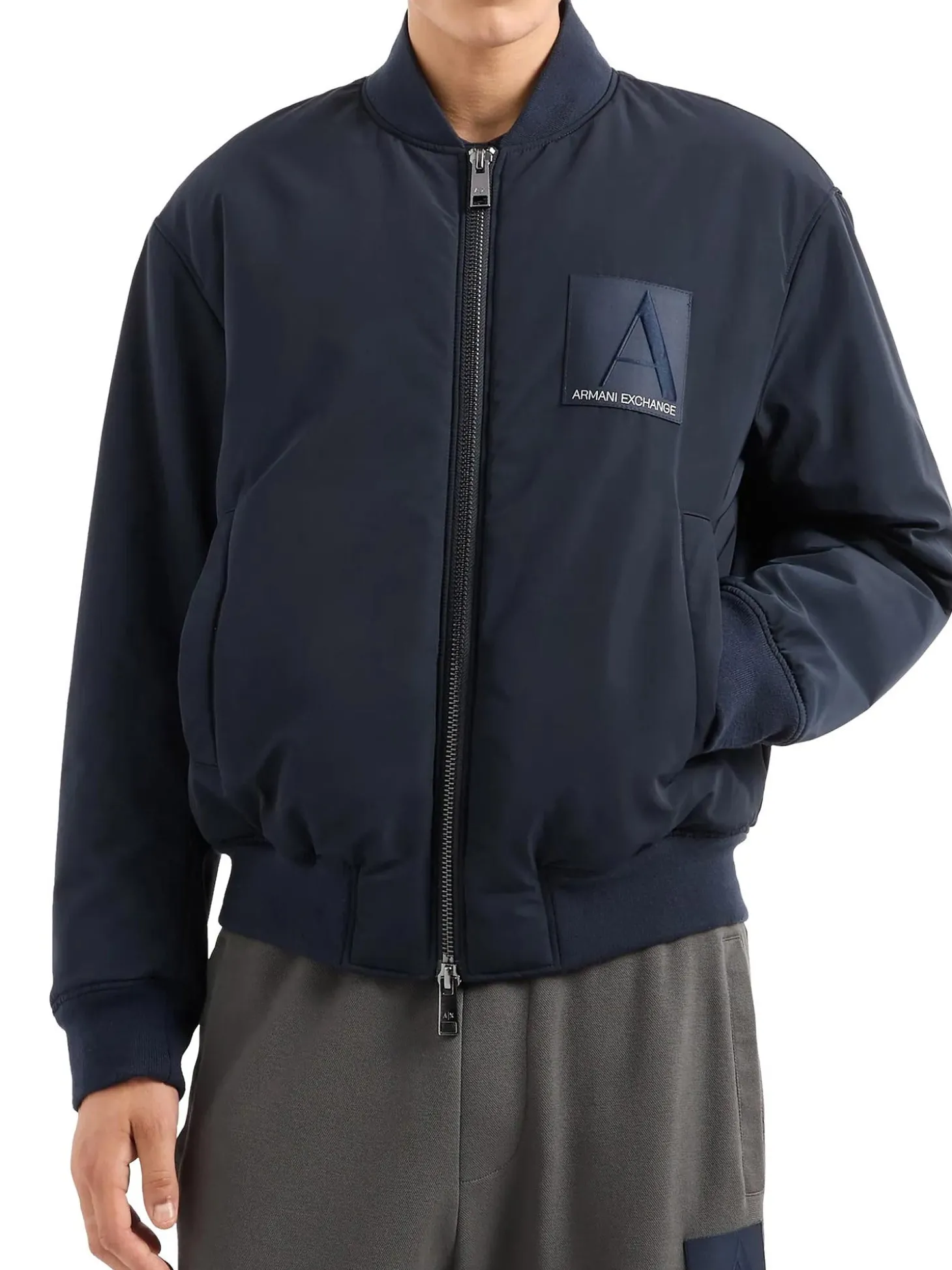 Bomber con zip patch logo blu