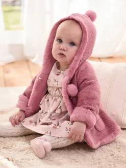 Cardigan cappuccio e pompon rosa