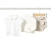 Completo giacca, blusa e shorts panna