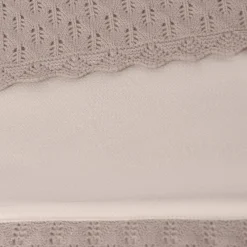 Copertina in maglia con pellicciotto interno beige