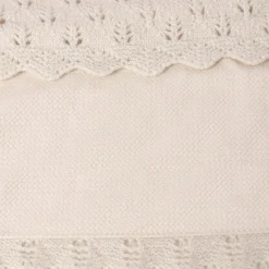 Copertina in maglia con pellicciotto interno panna