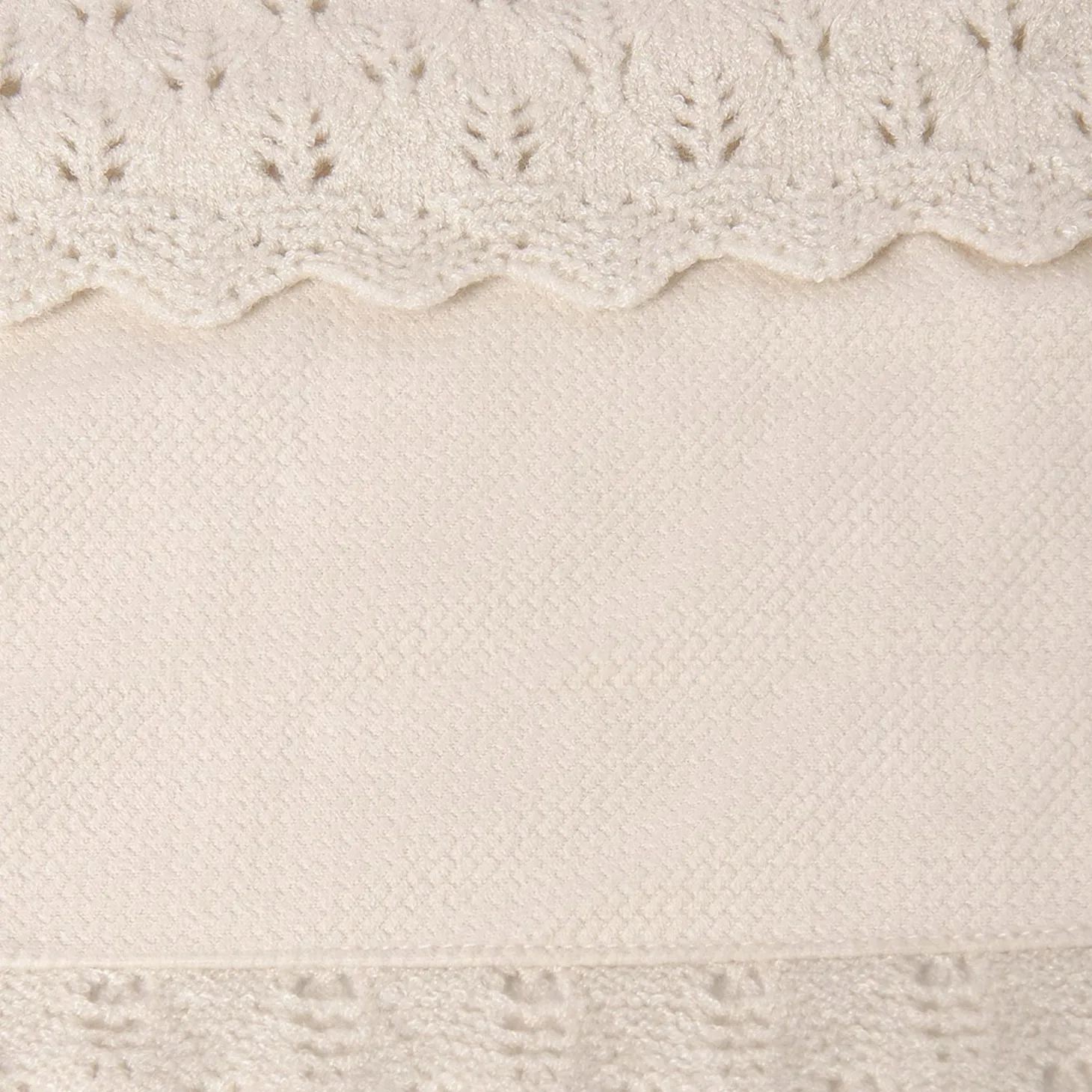 Copertina in maglia con pellicciotto interno panna
