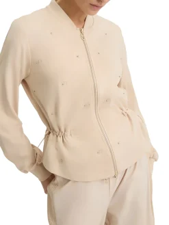 Felpa con zip e strass beige