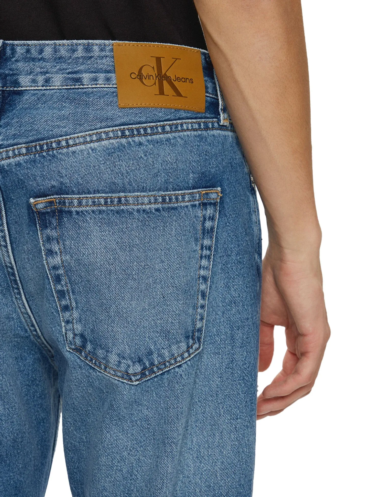 Jeans cropped con strappi denim medio