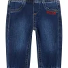 Jeans pull on con orsetto sul retro denim scuro