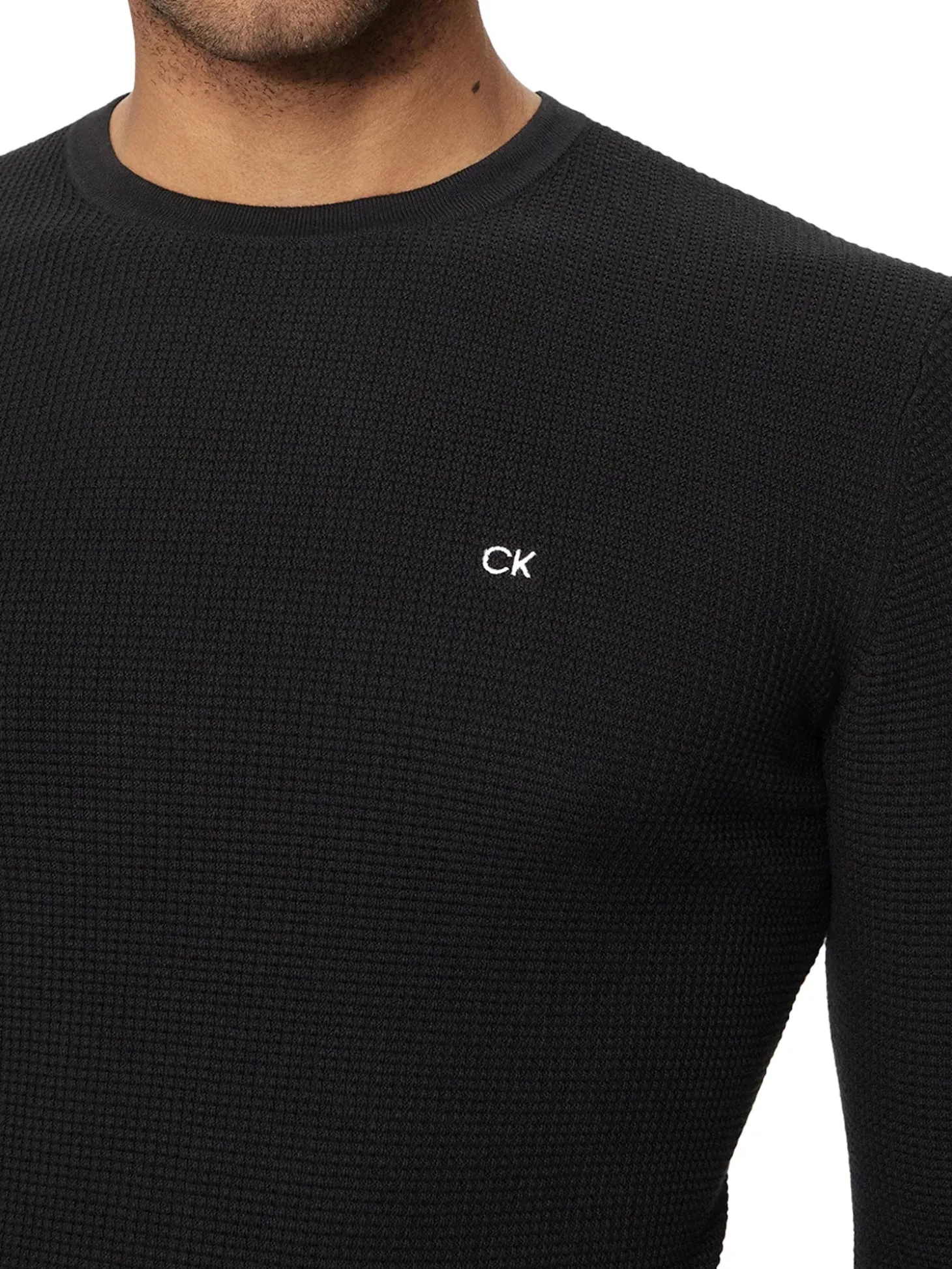 Maglione in texture con logo nero