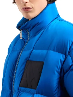 Piumino con zip e patch logo bluette