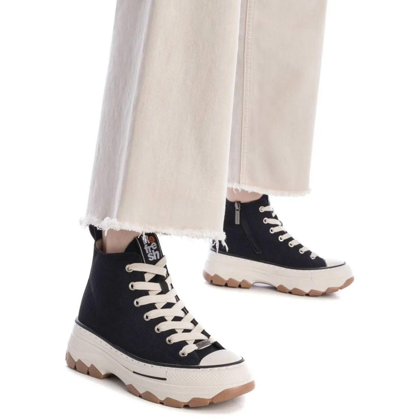 Sneakers alta con plateau nero