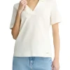 T-shirt con colletto a polo e strass bianco
