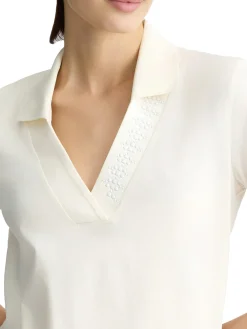 T-shirt con colletto a polo e strass bianco