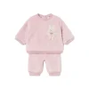 Tuta peluche patch rosa